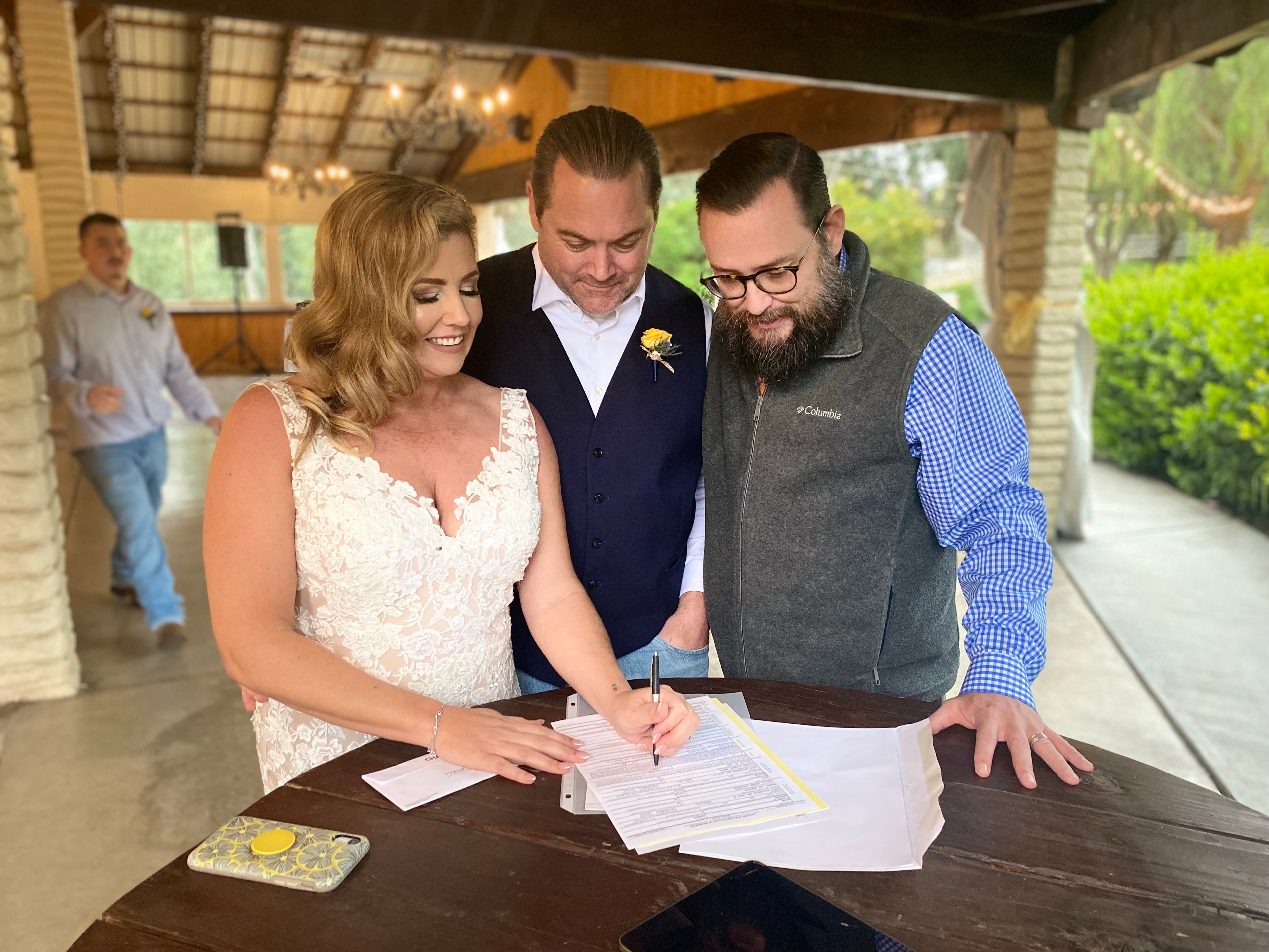 Couple exchanging vows at an outdoor California wedding